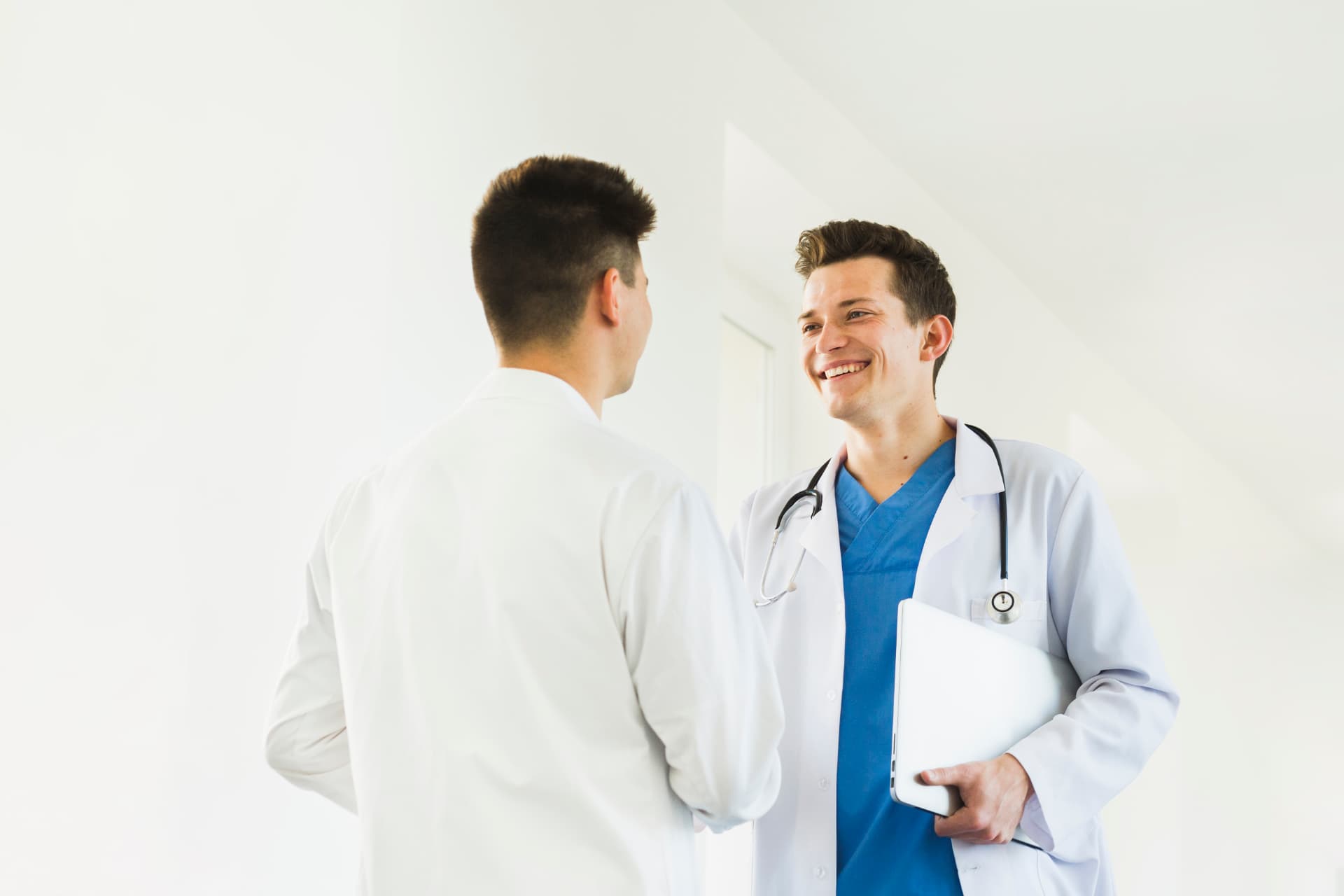 Two clinicians discussing a personalised hair treatment plan